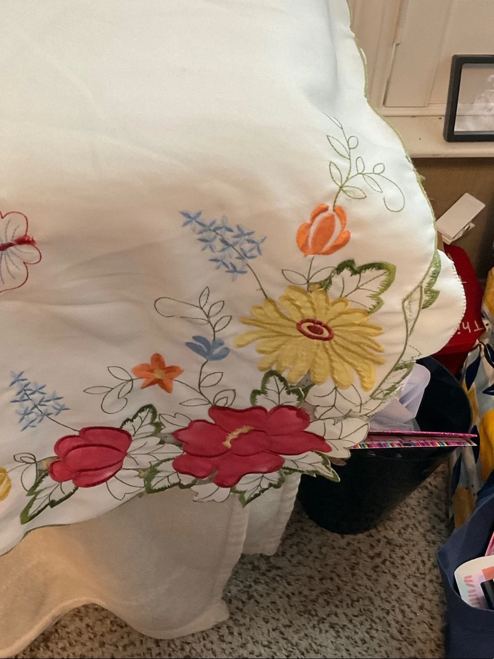 White Embroidered Floral Tablecloth with Red, Yellow & Pink Accents